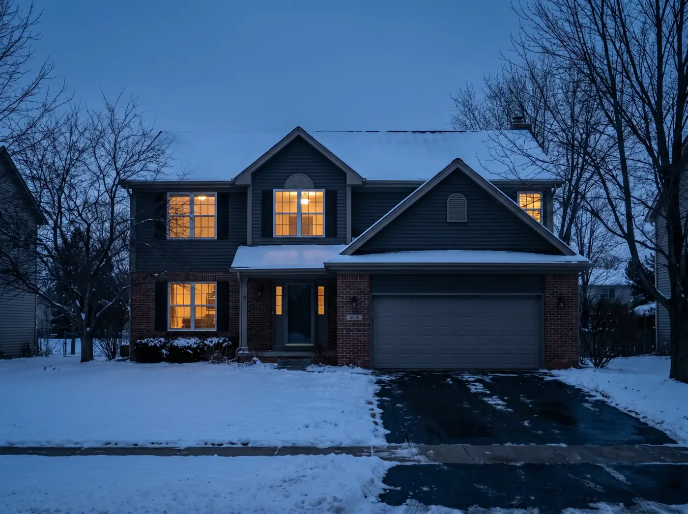 Illustrative medium home with Christmas lights